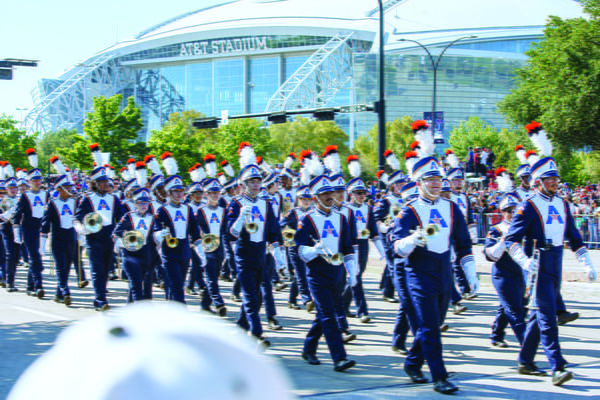 UTA Marching Band participating in the Texas Rangers championship parade